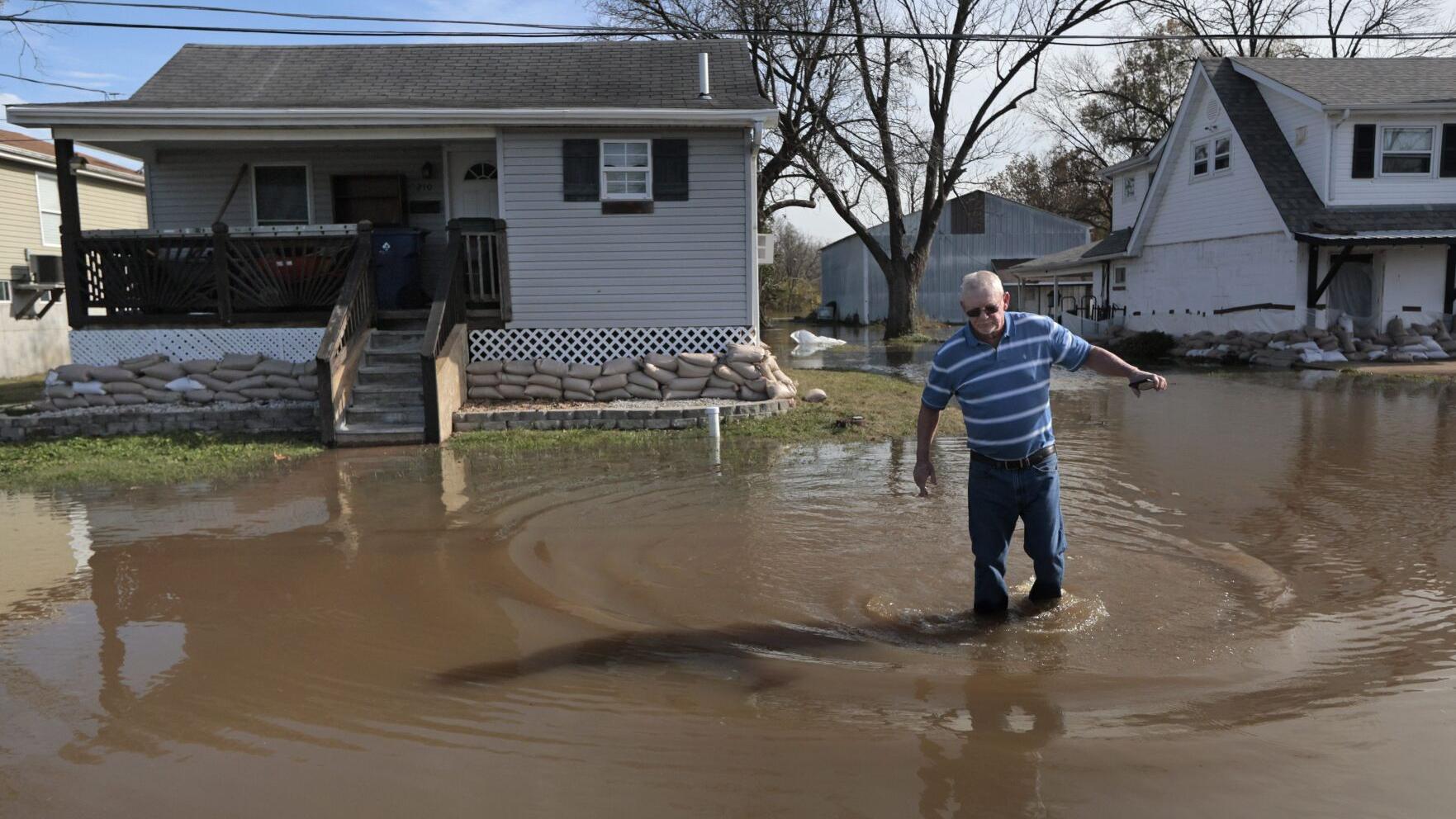 Video: Watch as Pacific resident checks to see if water got inside his son's home